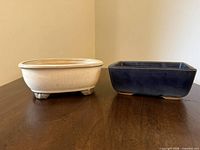Both bonsai pots front view