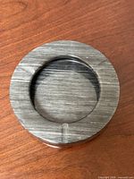 Top view of round gray marble ashtray