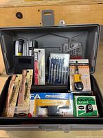 Toolbox open showing all packaged and loose tools