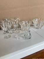 Group shot showing all 11 clear glass pieces
