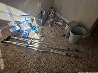 overview showing crutches, medical supplies, waste bins, shower caddy, storage drawers