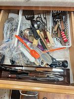 Drawer view of assorted utensils