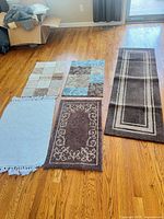All five rugs displayed on floor