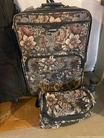 Floral print suitcase with matching bag