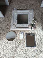 All three mirrors laid out showing sizes and styles
