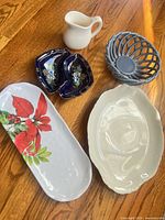 Group shot of all six serving pieces on wood surface