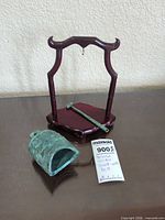 Bell, striker and stand together