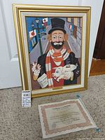 Framed reproduction painting with certificate displayed