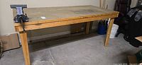Workbench front view with vise mounted
