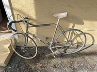 Full left-side view of steel road bike