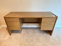 Full view of the desk showing overall design, finish and drawer pedestals