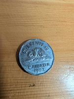 Reverse of 1952 Canadian 5-cent coin showing beaver design and date