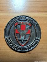 Front of medallion showing Guardian Angels 36th MED design and enamel coloring
