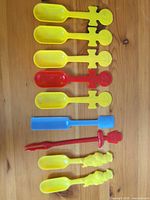 Group shot of all nine novelty plastic utensils