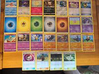 Grid of 24 cards showing trainers, energies and Pokémon