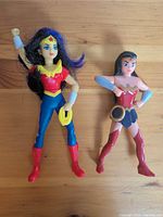 Both Wonder Woman action figures side by side