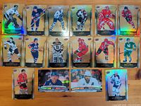 Sixteen holographic foil Upper Deck Tim Hortons cards laid out
