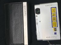 Camera and case front view, lens uncovered