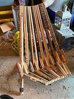 Front angled view showing entire chair made of hockey sticks