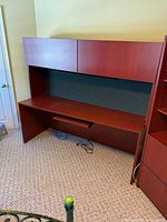 Front view of desk and hutch showing sliding cabinet doors closed