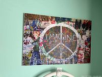Front view of Imagine peace wall poster mounted on wall