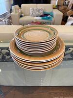 Stacked set showing side profile of all 13 plates