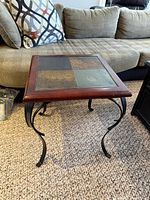 Full view of slate tile top end table showing materials and overall design