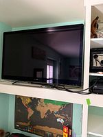 Front view of Sony flat-panel TV on stand