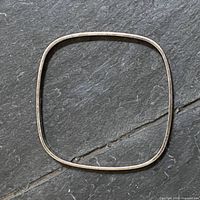 Top view of entire bangle showing rounded square shape