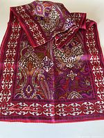 Full view of folded scarf showing overall pattern and colors