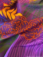 Close-up of floral and foliage pattern colors and silk texture