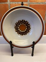 Full view of bowl showing interior decoration and rim bands