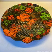 Full view of round floral tray showing scalloped edge and overall pattern