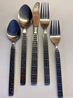 overview of representative spoon and fork showing handle pattern