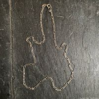 Full view of the Figaro chain laid flat