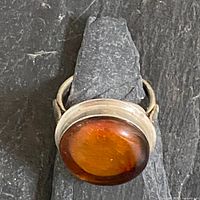 Top view showing amber cabochon and bezel