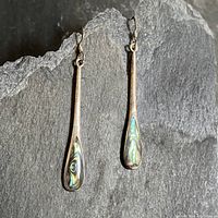 Full view of both sterling silver abalone drop earrings