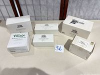 All six boxed Department 56 Heritage Village accessory sets on table