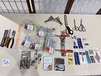 Overall view showing all bagged Wal-Rich clamps, toggle clamps, scissors, blade packs and hand tools