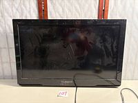 Front view of Panasonic TC-L32C3 TV powered on