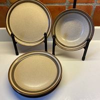 All five stoneware pieces displayed