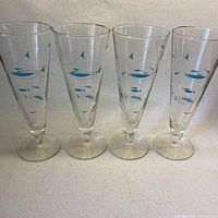 Full group of four glasses upright