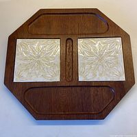 Full view of octagonal wooden cheeseboard showing overall design and tile placement