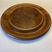 Full top view of round solid wood cheeseboard
