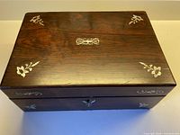 overall top view showing walnut grain and inlay pattern