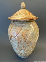 Full view of lidded vessel