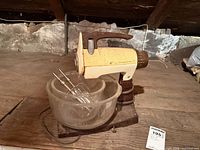 Full view of mixer on stand with bowls and beaters