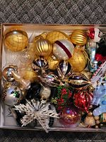 Overview of entire box showing variety of ornaments