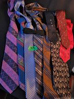 Front view showing nine assorted neckties