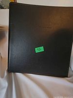 Closed album showing faux leather cover